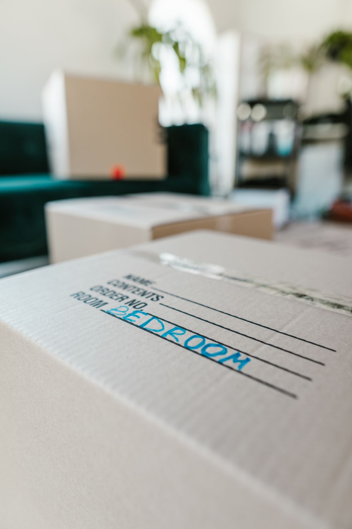 Packed and labelled moving boxes